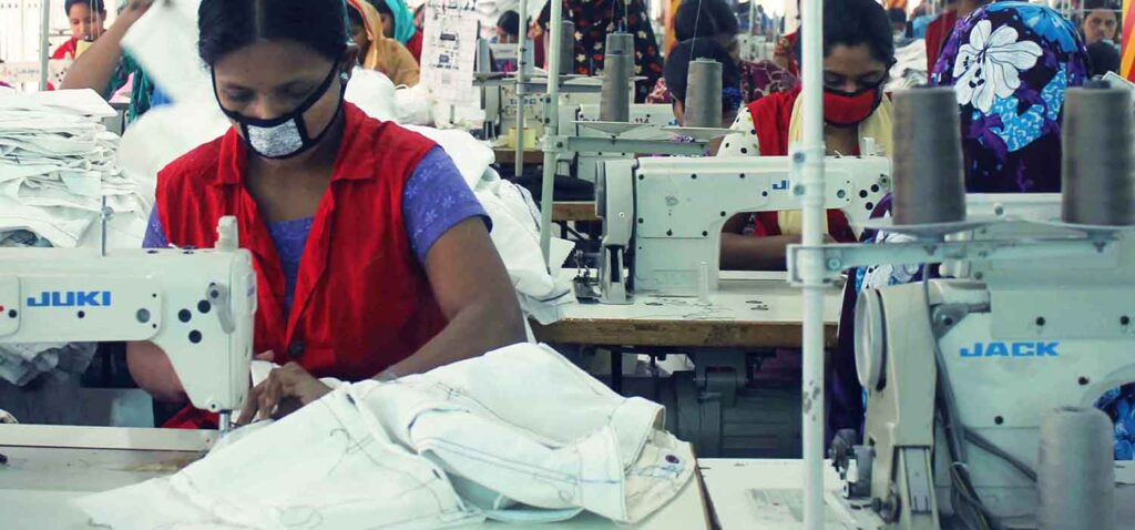 Sewing production section at Wenext medical uniform factory